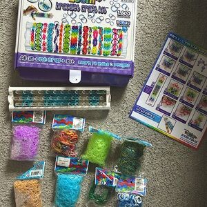 Rainbow loom plus thousands of bands, glow in the dark and sparkle colors